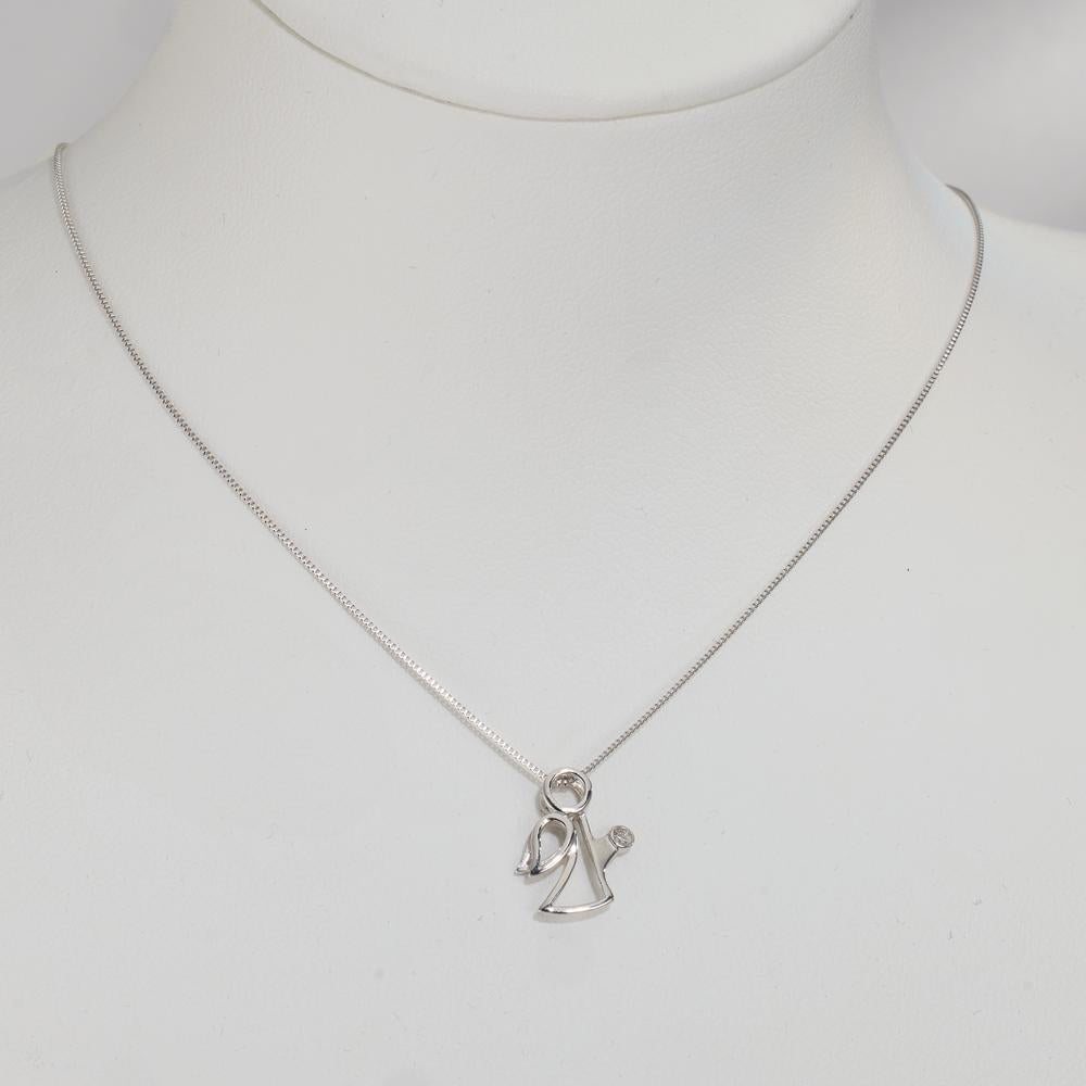 Hängsmycke 750/18 K vitguld diamant 0.007 ct, w-si ängel