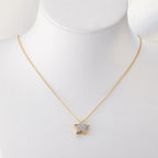 Hängsmycke 750/18 K gult guld diamant 0.08 ct, w-si stjärna Ø10 mm